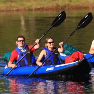 Two paddlers paddling the Sea Eagle 380X inflatable kayak.