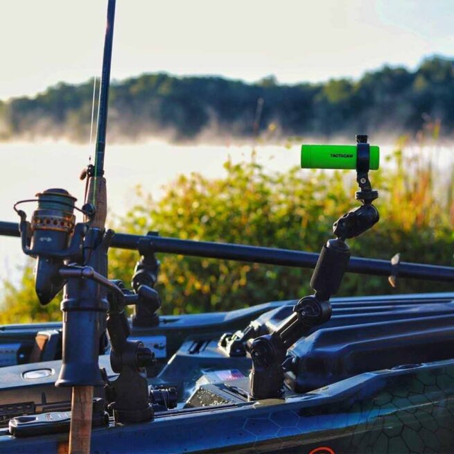 YakAttack with Fishing rods on boat at misty lakeside dawn. Available at Riverbound Sports in Tempe, Arizona.