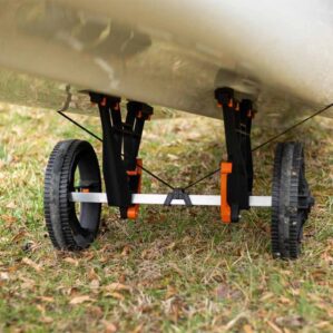 Fishing kayak on YakAttack black and orange kayak cart. Available at Riverbound Sports in Tempe, Arizona.